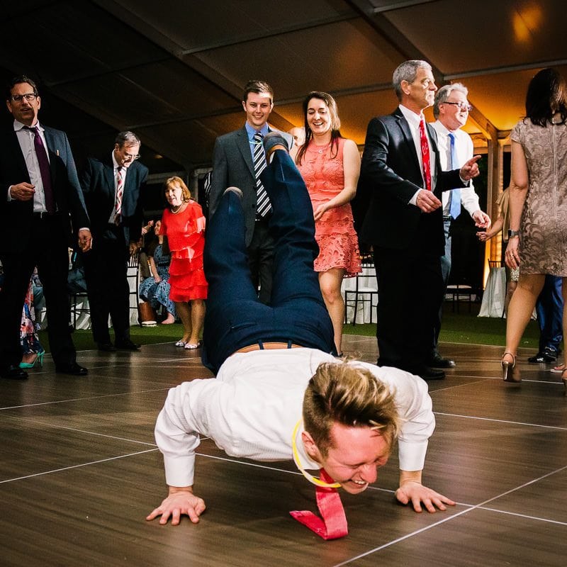 Wedding guest does the worm dance at reception