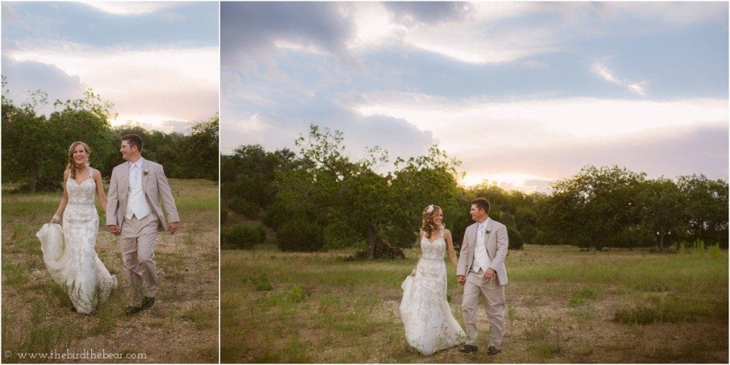 Bride and groom walk through the field together after their Sacred oaks wedding in dripping springs, tx.