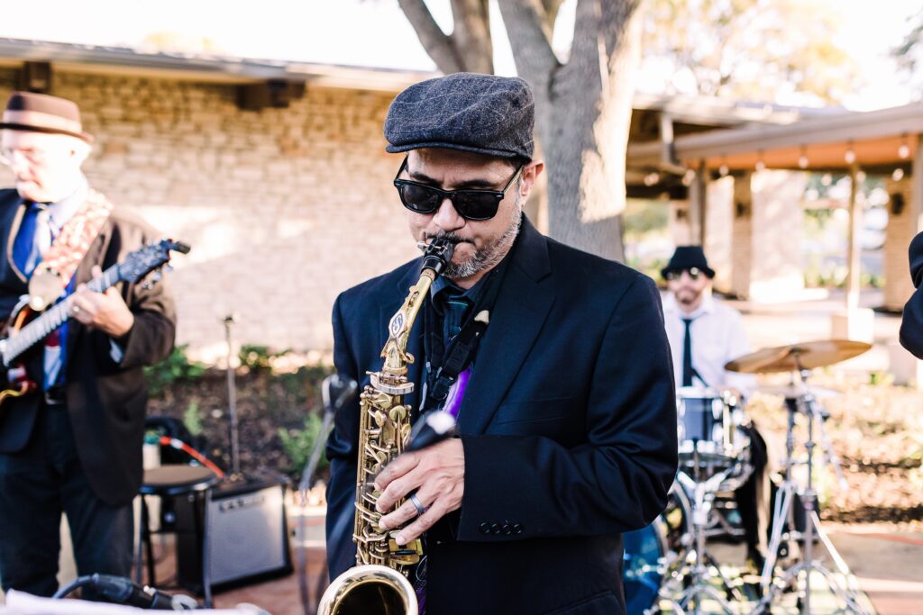 Man playing saxophone at Lakeway Resort wedding