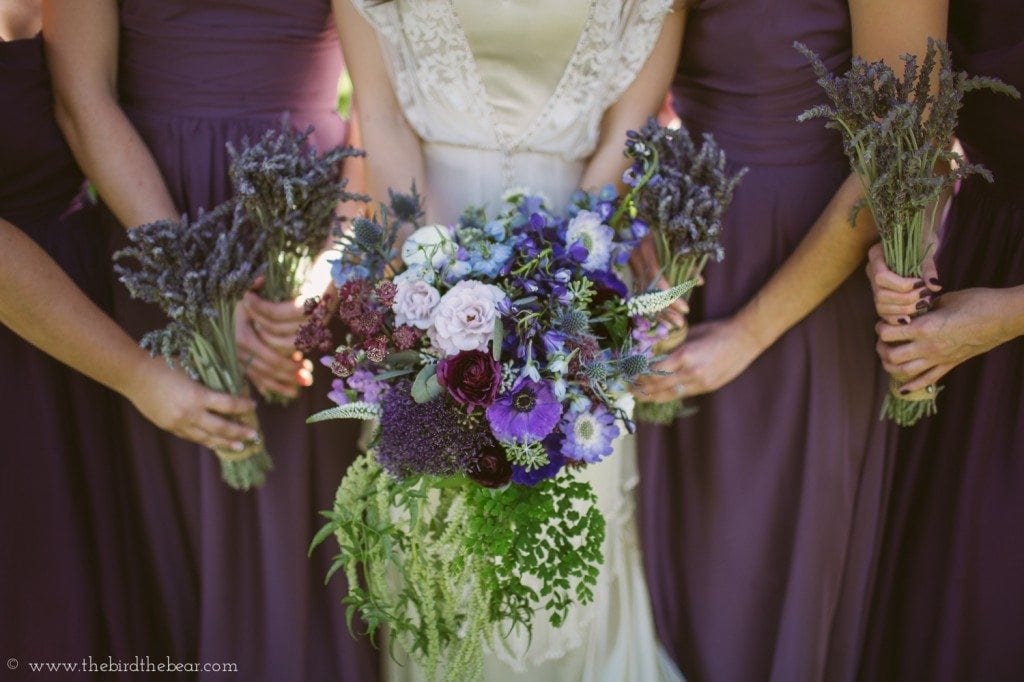 purple wedding bouquets with plum bridesmaids 