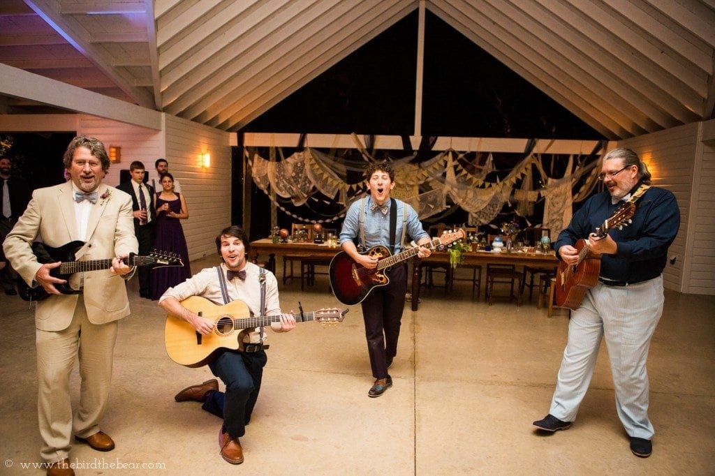 groom plays an irish song to the bride 