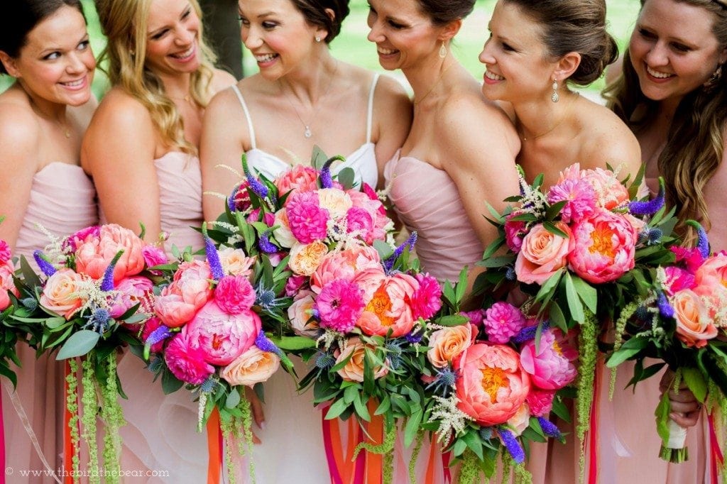 Vibrant coral and fuscia wedding flowers.