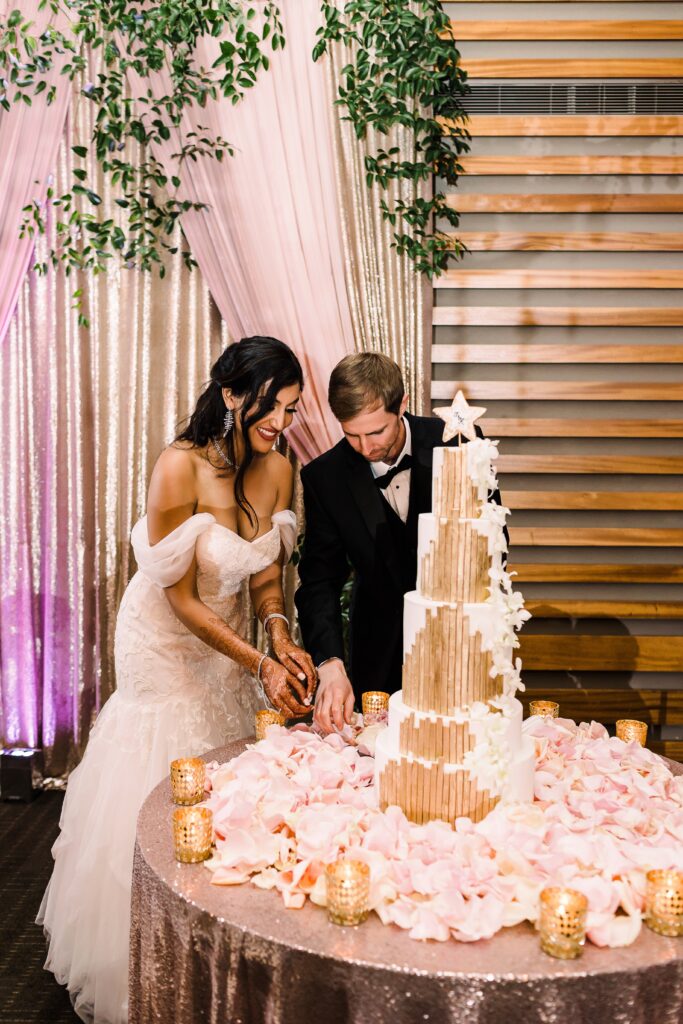 Bride and groom cutting cake at their Lakeway Resort wedding