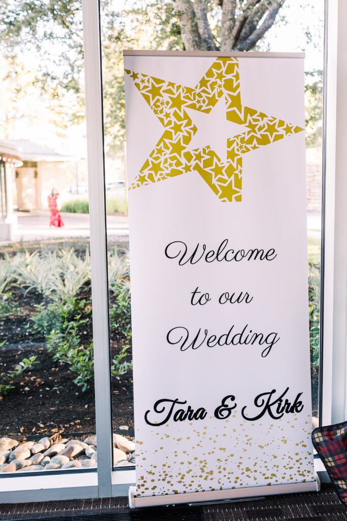 White and gold welcome sign at Lakeway Resort wedding