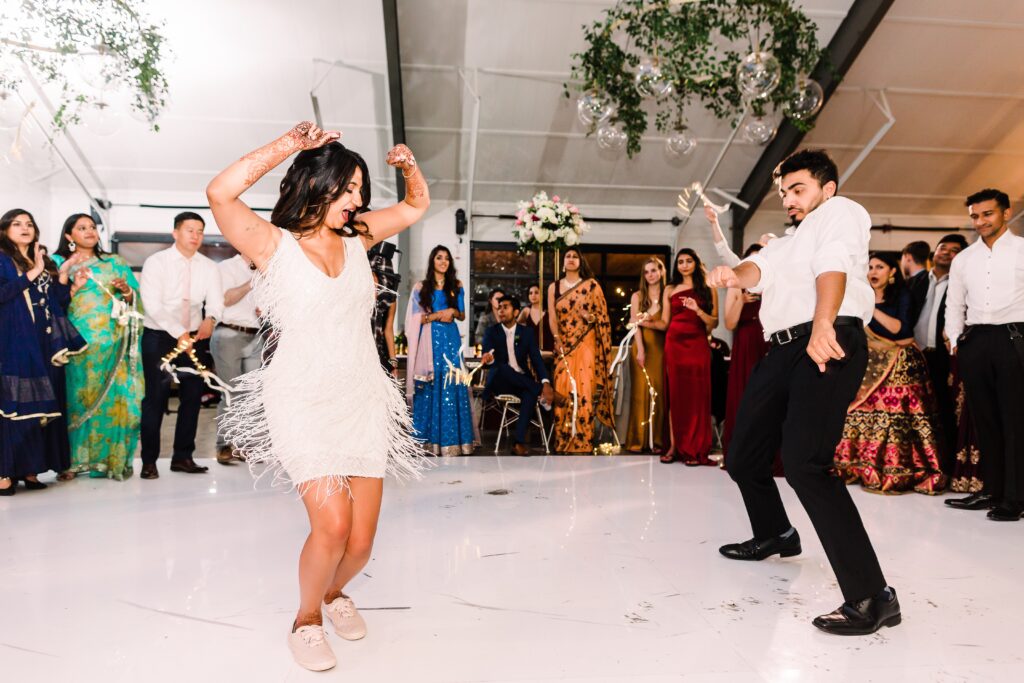 Bride dancing on dance floor at Maes Ridge wedding reception