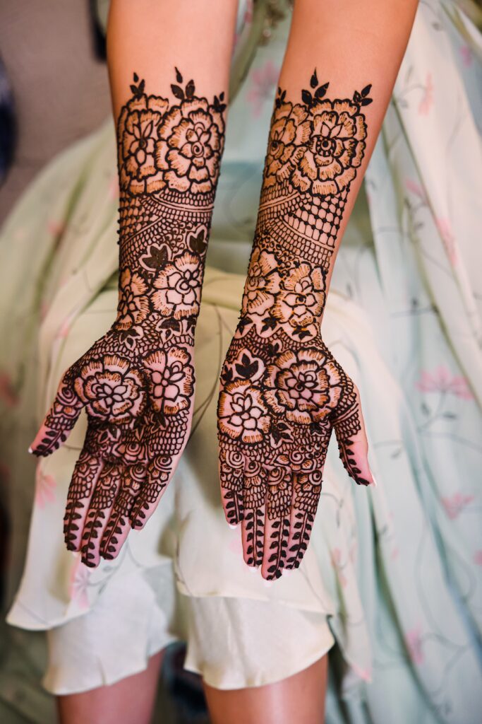 Bride's henna on arms at her Mae's Ridge wedding mehndi