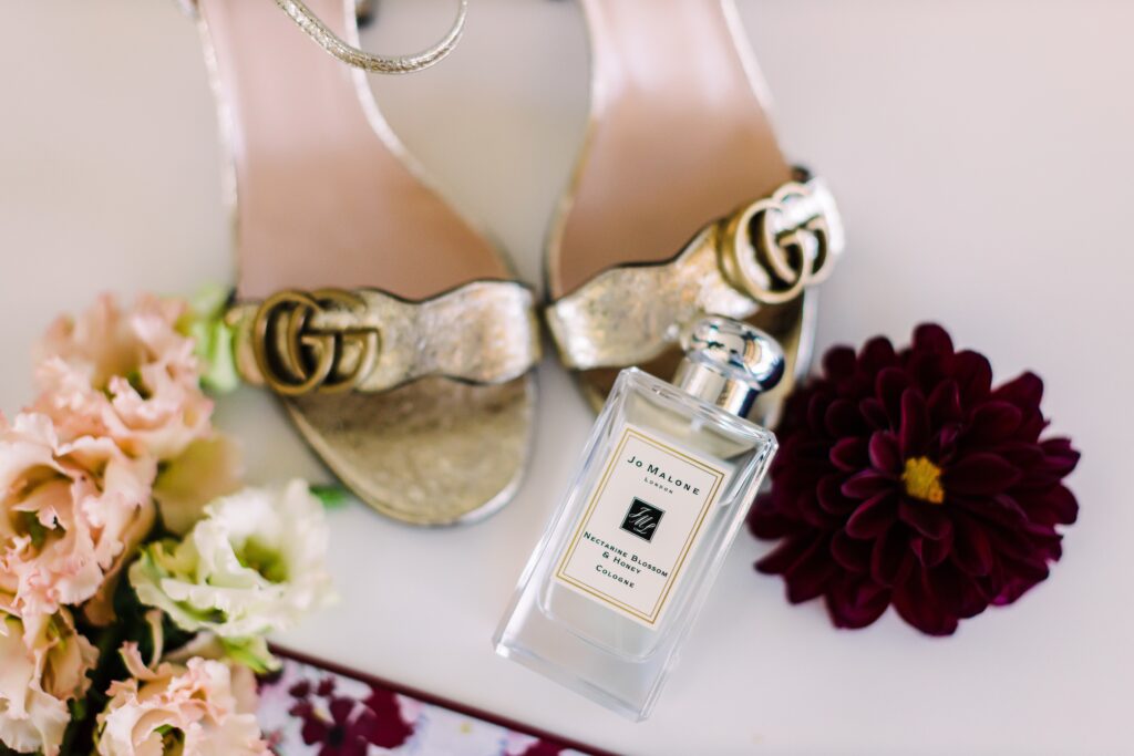 Shoes and perfume for a Maes Ridge wedding